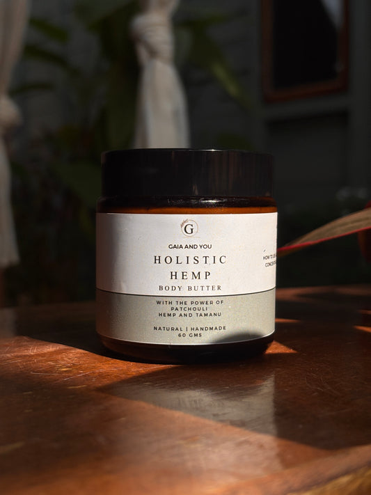 Image of a bottle of Holistic Hemp body butter made with hemp, patchouli, and tamanu with shea butter, mango butter, and kokum butter.